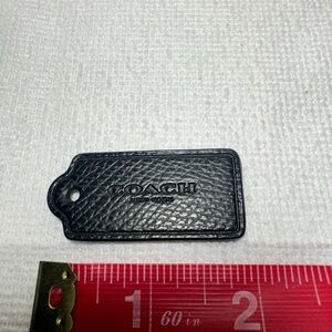 Coach Textured Black Leather Tag